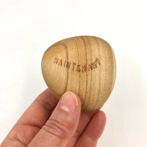 Objet symbolique en bois porteur de sens